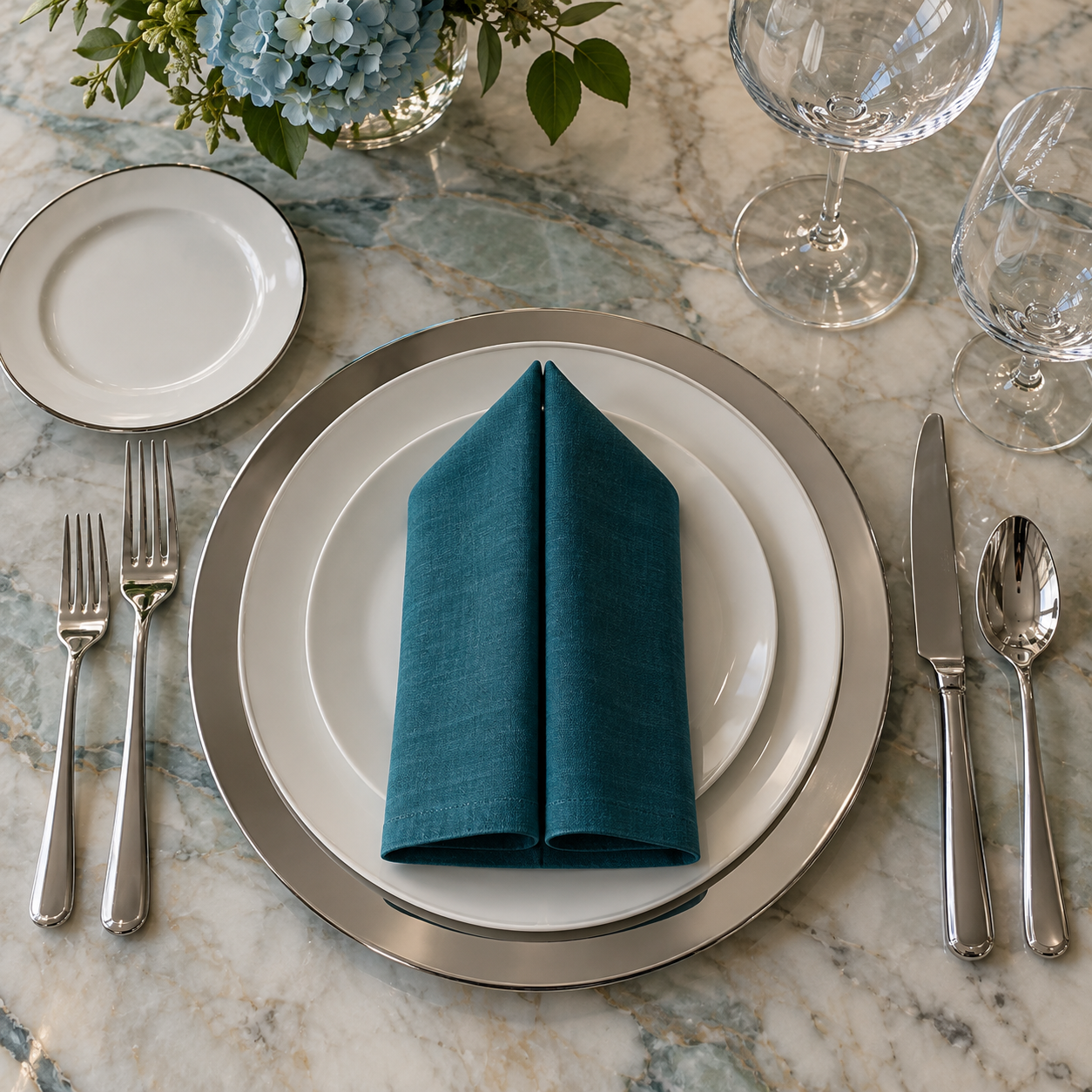 A precisely set table in a fine-dining room